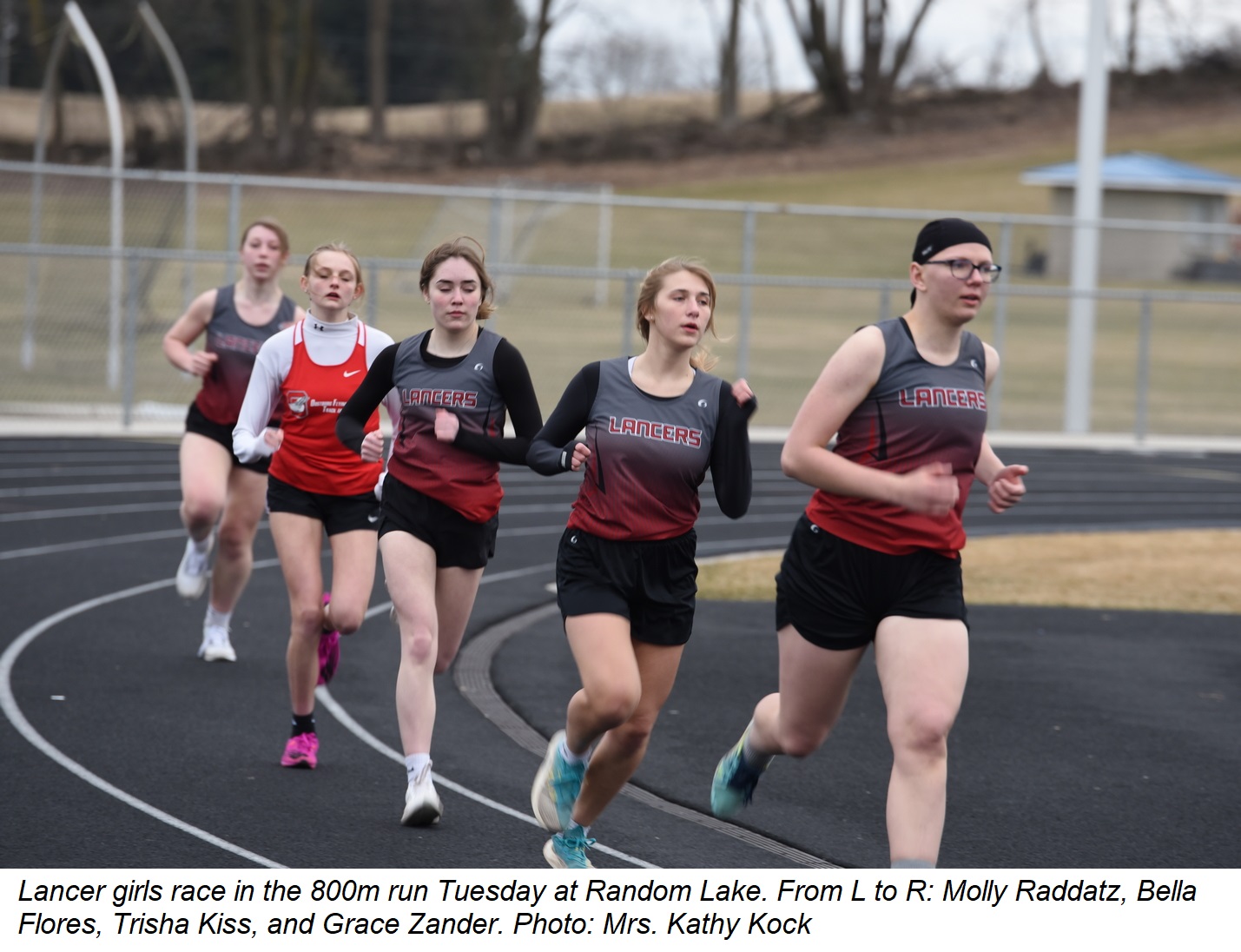 Lancer girls race in the 800m run at Random Lake Tuesday. From L to R: Molly Raddatz, Bella Flores, Trisha Kiss, and Grace Zander.