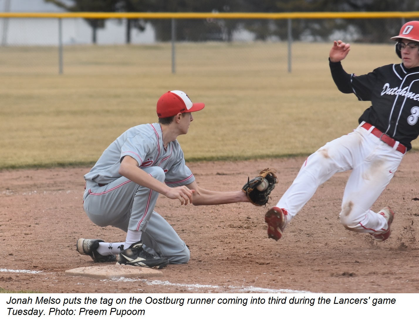 Jonah Melso puts the tag on the Oostburg base runner.