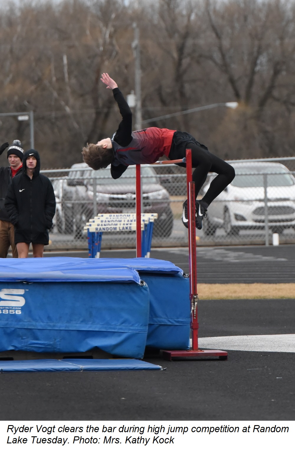 Ryder Vogt clears the bar during high jump competition at Random Lake Tuesday.