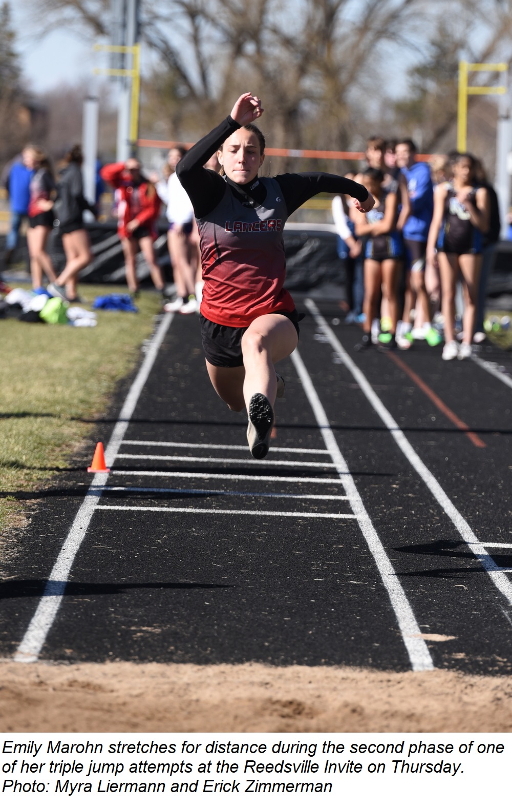 Emily Marohn stretches for distance during one of her triple jump attempts at the Reedsville Invite Thursday.